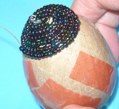 fletning av egg med perler